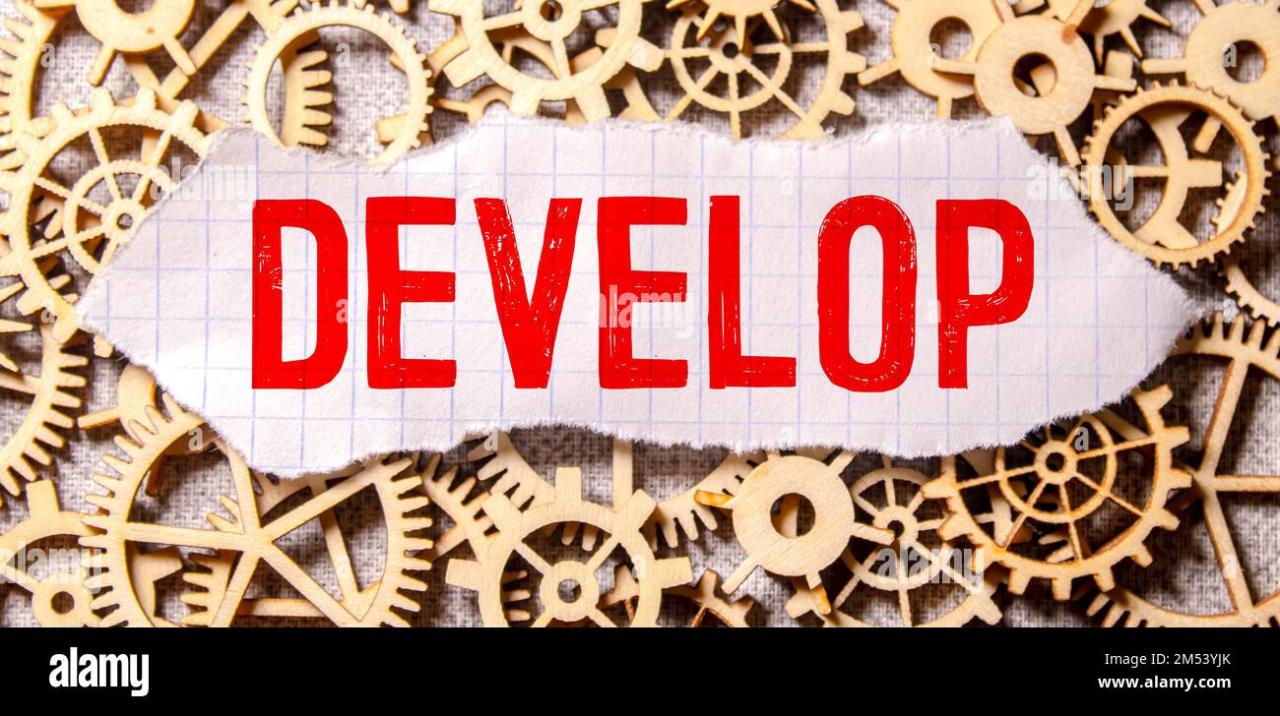 Develop word written on wood block. Develop text on cement table for ...